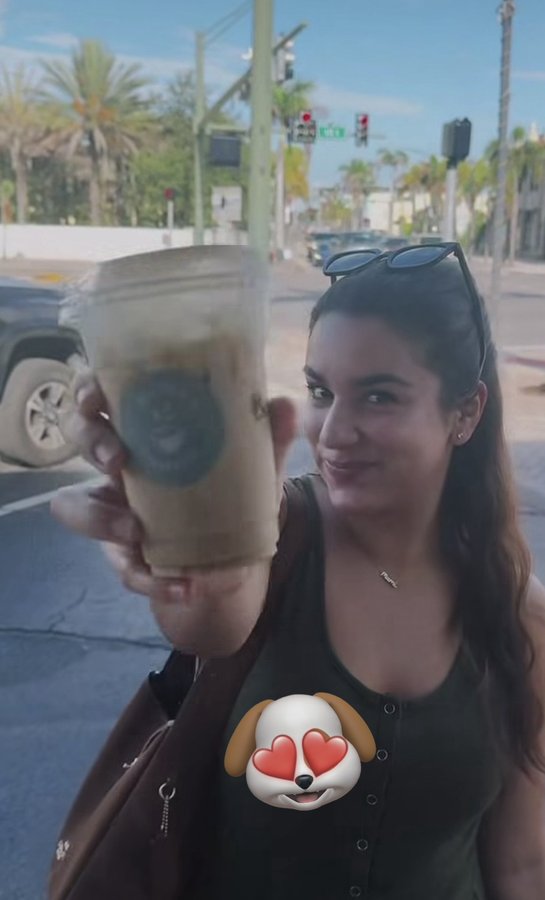 Two customers holding Double H Coffee Co. iced coffees